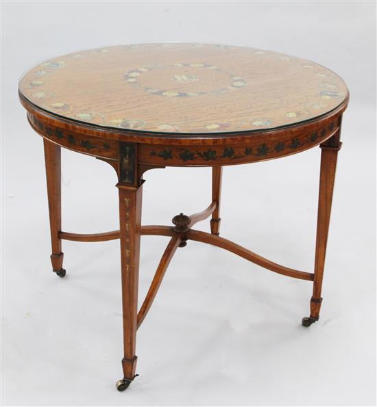 A Sheraton revival circular satinwood and floral painted centre table, W.3ft